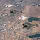 Illustration for article titled These Photos Of Thunderbirds F-16s Flying With F-22 Raptors Is A Whole Lot Of America